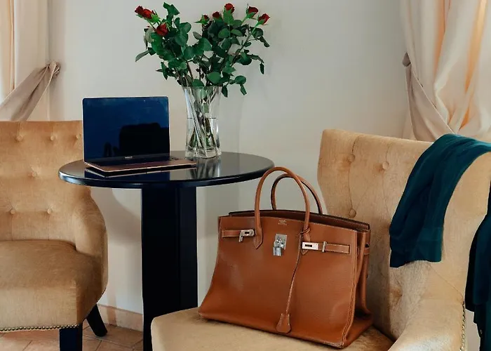 Relais Giulia Couette-café 4*